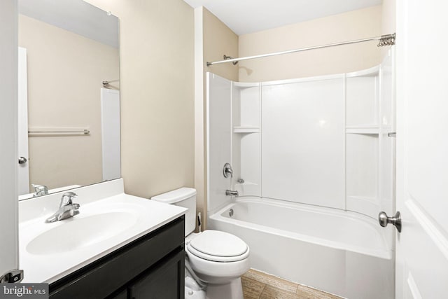 full bathroom featuring vanity, toilet, and shower / bathtub combination