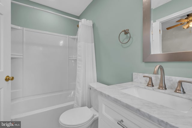 full bathroom with vanity, shower / bath combo with shower curtain, toilet, and ceiling fan