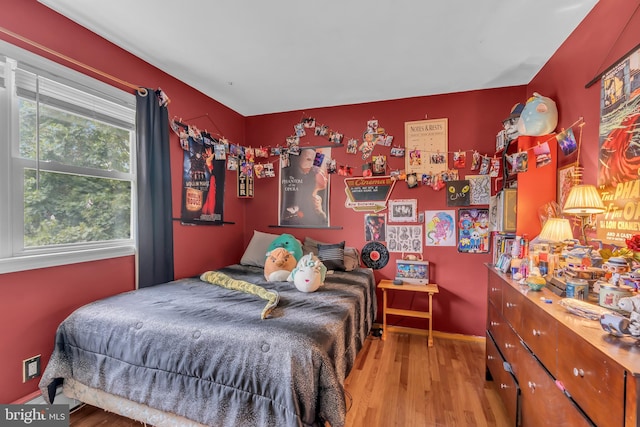 bedroom featuring light wood-type flooring