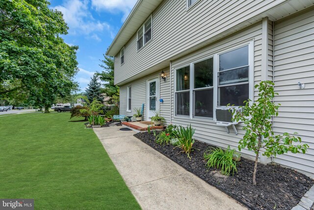 exterior space with a lawn