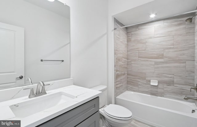 10812 Willow Ter, Fairfax, VA 22030 - bathroom with vanity, toilet, and bathing tub / shower combination