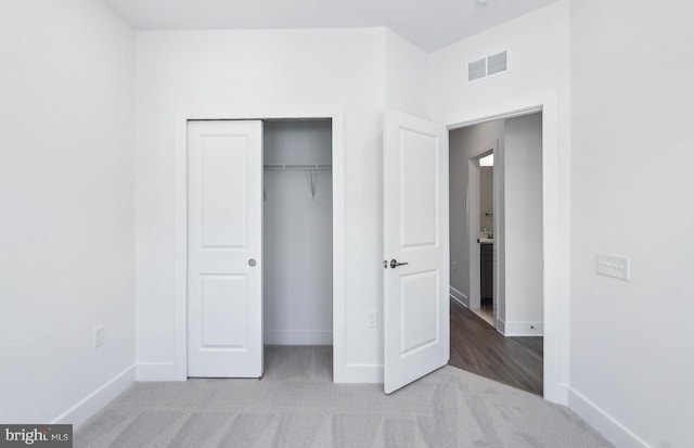 10812 Willow Ter, Fairfax, VA 22030 - unfurnished bedroom with carpet flooring, baseboards, and a closet