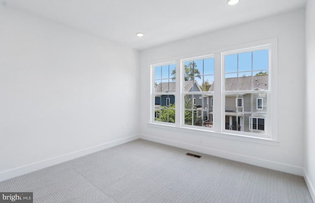 10812 Willow Ter, Fairfax, VA 22030 - unfurnished room featuring baseboards, carpet floors, and recessed lighting