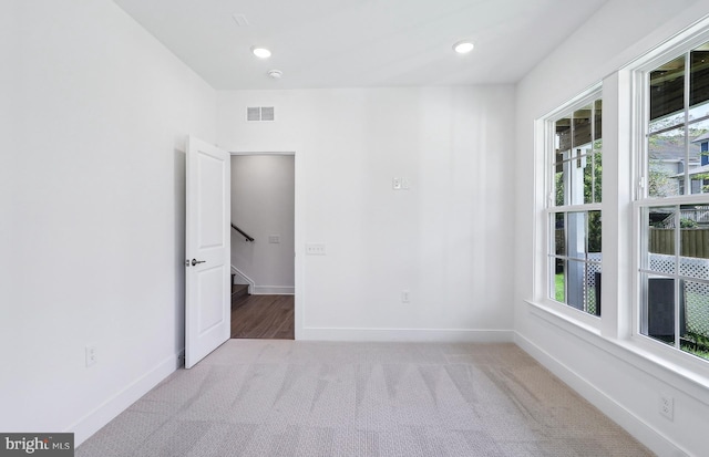 10812 Willow Ter, Fairfax, VA 22030 - carpeted empty room featuring baseboards and recessed lighting