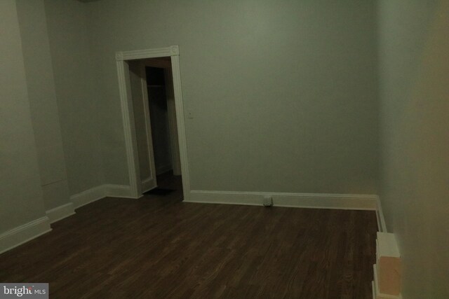 2032 E N Ave, Baltimore, MD 21213 - unfurnished room featuring baseboards and dark wood finished floors