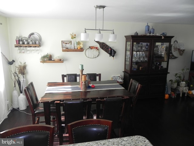 dining area featuring hardwood / wood-style flooring