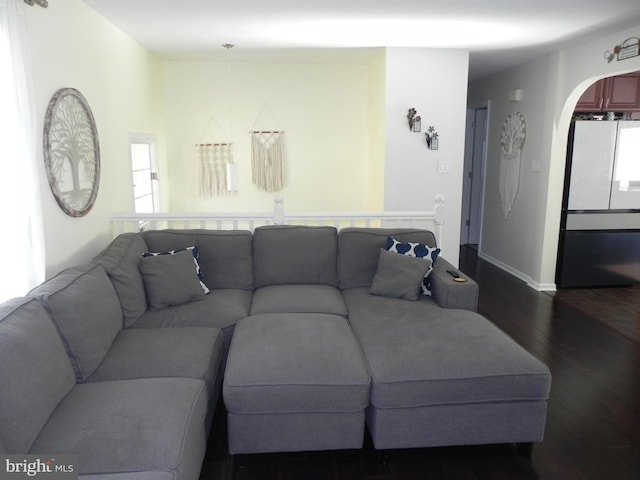 living room featuring dark hardwood / wood-style flooring