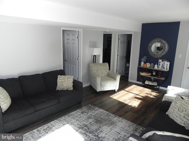 living room with dark hardwood / wood-style floors