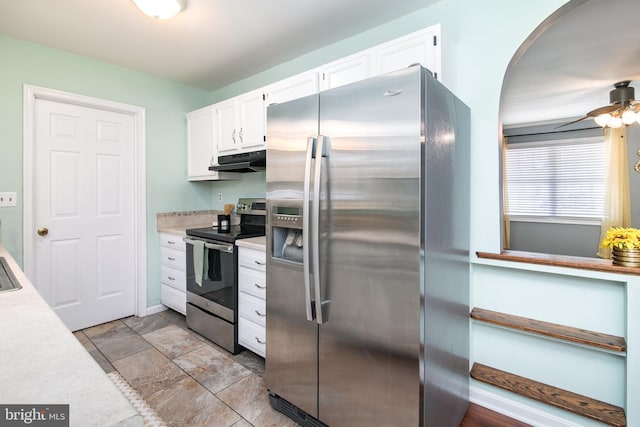 kitchen featuring appliances with stainless steel finishes, white cabinetry, and ceiling fan