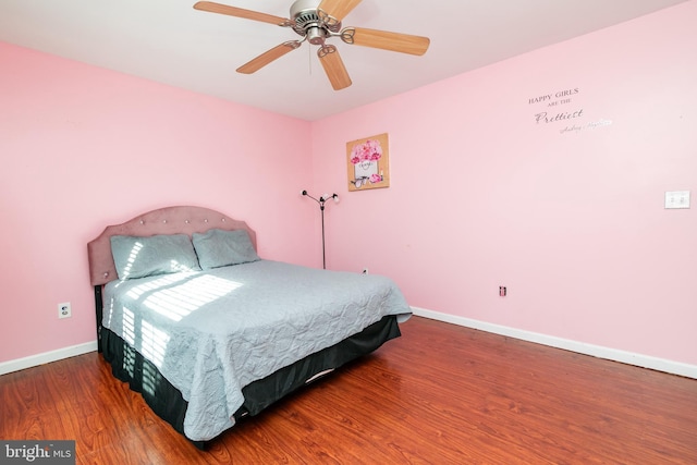 bedroom featuring wood-type flooring and ceiling fan