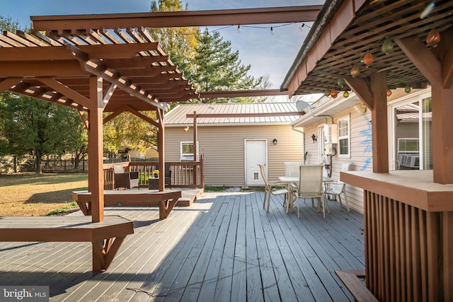 wooden terrace with a yard