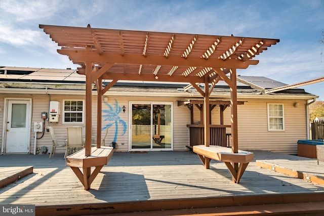 wooden terrace with a pergola