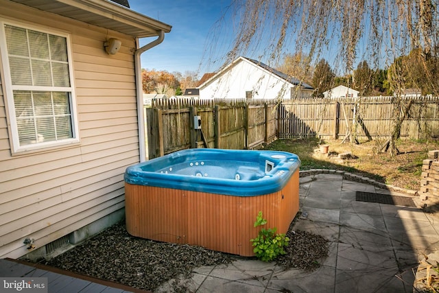 view of patio featuring a hot tub