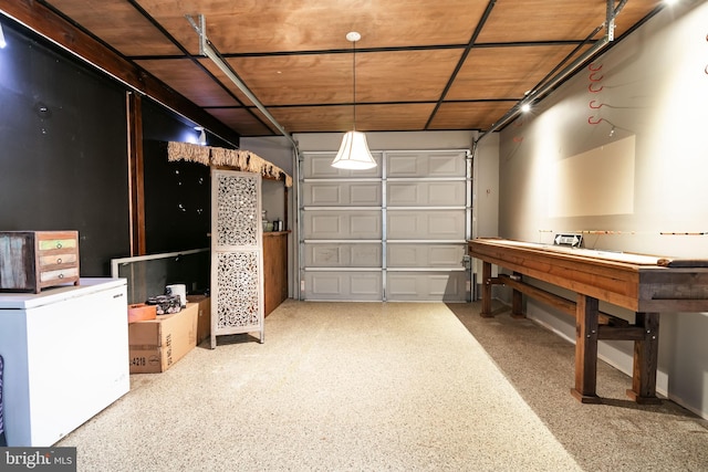 garage featuring fridge