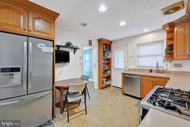 kitchen featuring appliances with stainless steel finishes and sink