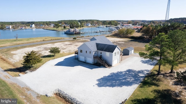 drone / aerial view with a water view