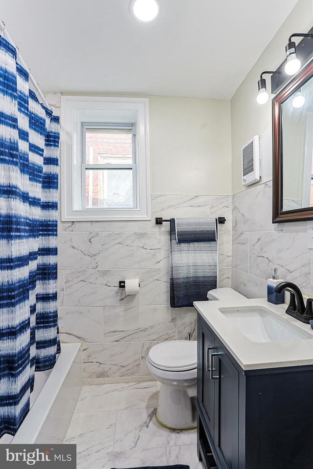 full bathroom featuring tile walls, vanity, shower / bath combination with curtain, and toilet