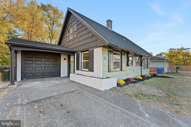 view of front of home with a garage