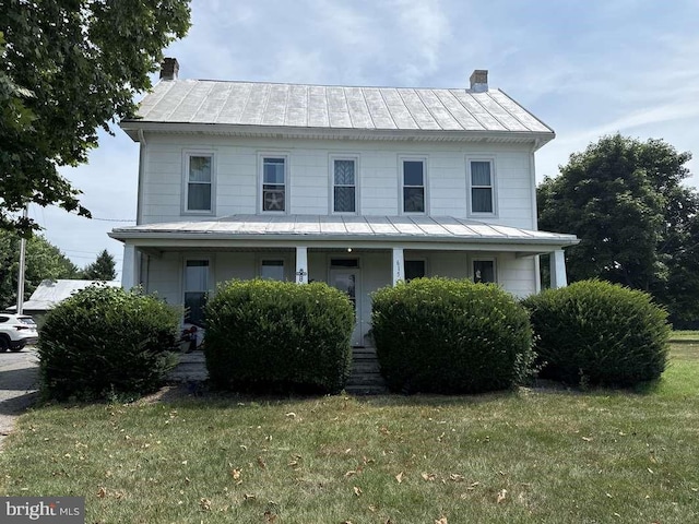 view of front of property with a front lawn