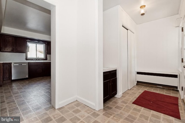 corridor with radiator heating unit and sink