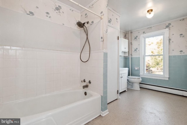 full bathroom featuring vanity, a baseboard heating unit, shower / bathing tub combination, toilet, and tile walls