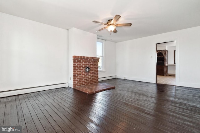 unfurnished living room featuring ceiling fan, baseboard heating, and dark hardwood / wood-style floors