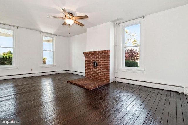 unfurnished living room with hardwood / wood-style floors, baseboard heating, ceiling fan, and a fireplace