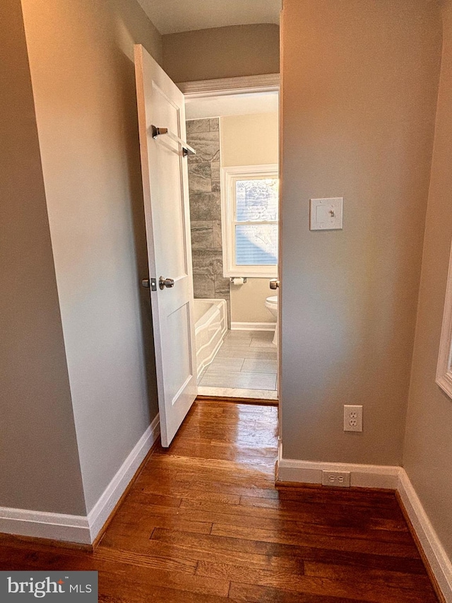 interior space with hardwood / wood-style floors