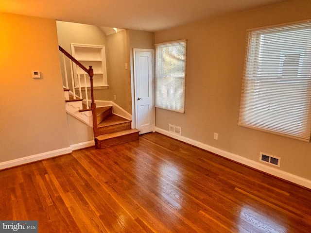 entrance foyer featuring wood-type flooring