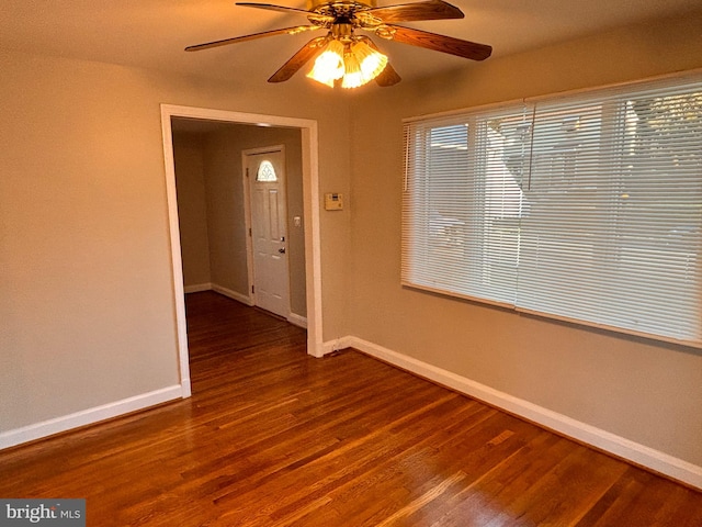 unfurnished room with hardwood / wood-style floors and ceiling fan