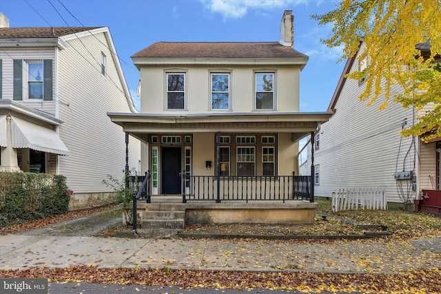 view of front of property featuring covered porch