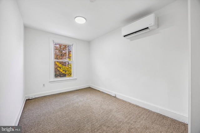 unfurnished room with carpet floors and a wall mounted air conditioner