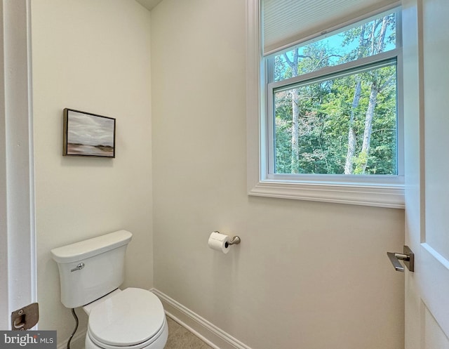 bathroom featuring toilet