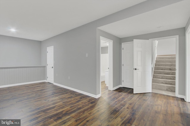 empty room featuring dark hardwood / wood-style floors