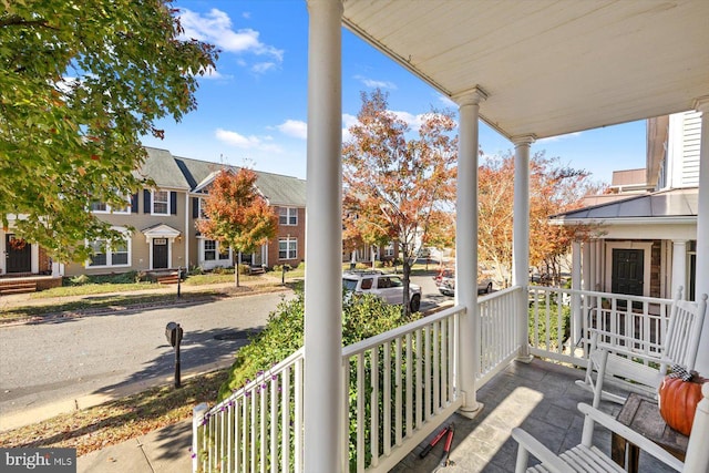 balcony featuring a porch