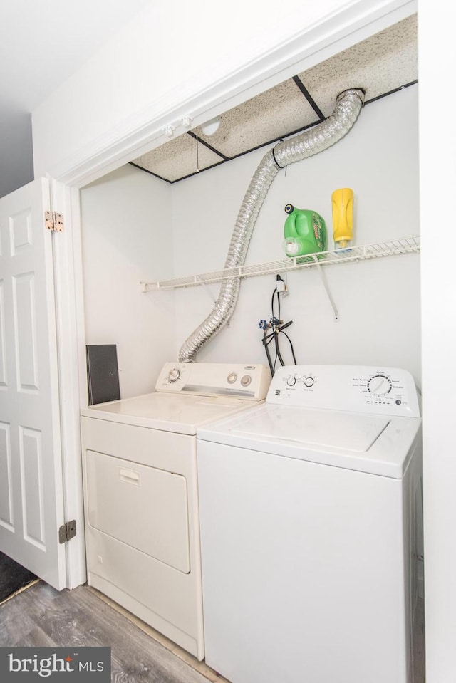 4624 Rhawn St, Philadelphia, PA 19136 - washroom with washing machine and clothes dryer and wood finished floors