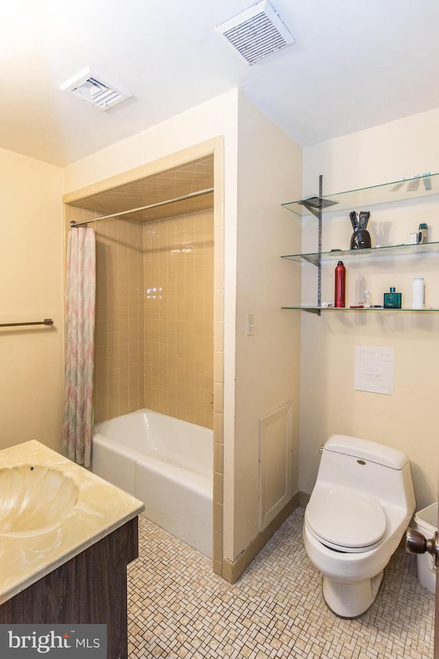 full bathroom with shower / tub combo with curtain, vanity, toilet, and visible vents