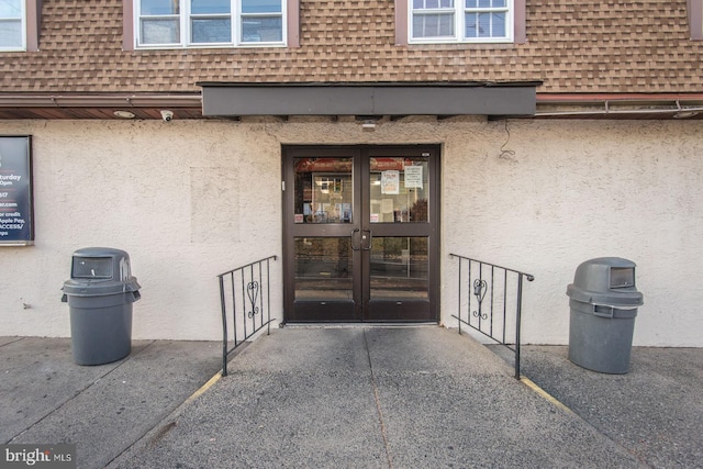 property entrance featuring french doors