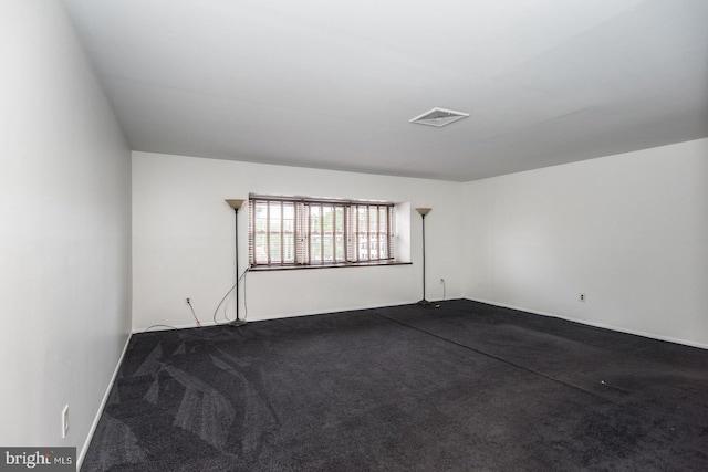 4624 Rhawn St, Philadelphia, PA 19136 - empty room with dark colored carpet