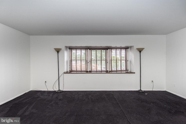 4624 Rhawn St, Philadelphia, PA 19136 - unfurnished room featuring dark carpet and baseboards