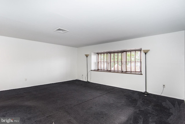 4624 Rhawn St, Philadelphia, PA 19136 - spare room with dark colored carpet and baseboards