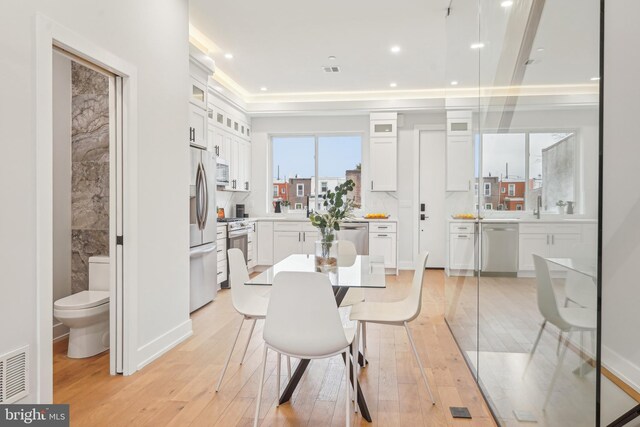 3003 Gaul St, Philadelphia, PA 19134 - dining area featuring recessed lighting, visible vents, and light wood-style floors