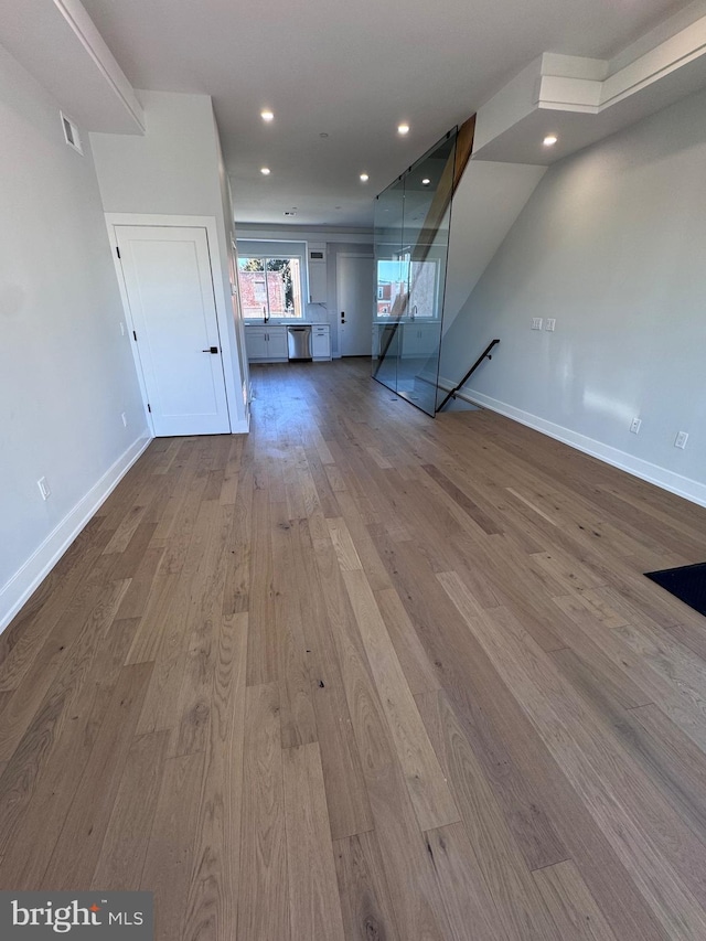 3003 Gaul St, Philadelphia, PA 19134 - unfurnished living room with baseboards, recessed lighting, visible vents, and wood finished floors
