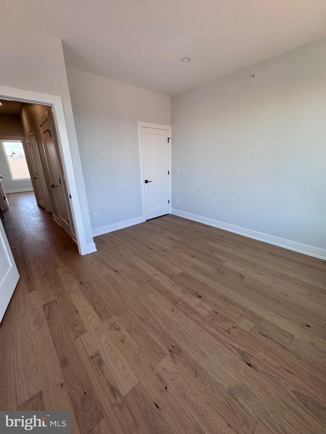 3003 Gaul St, Philadelphia, PA 19134 - unfurnished bedroom with baseboards and hardwood / wood-style flooring