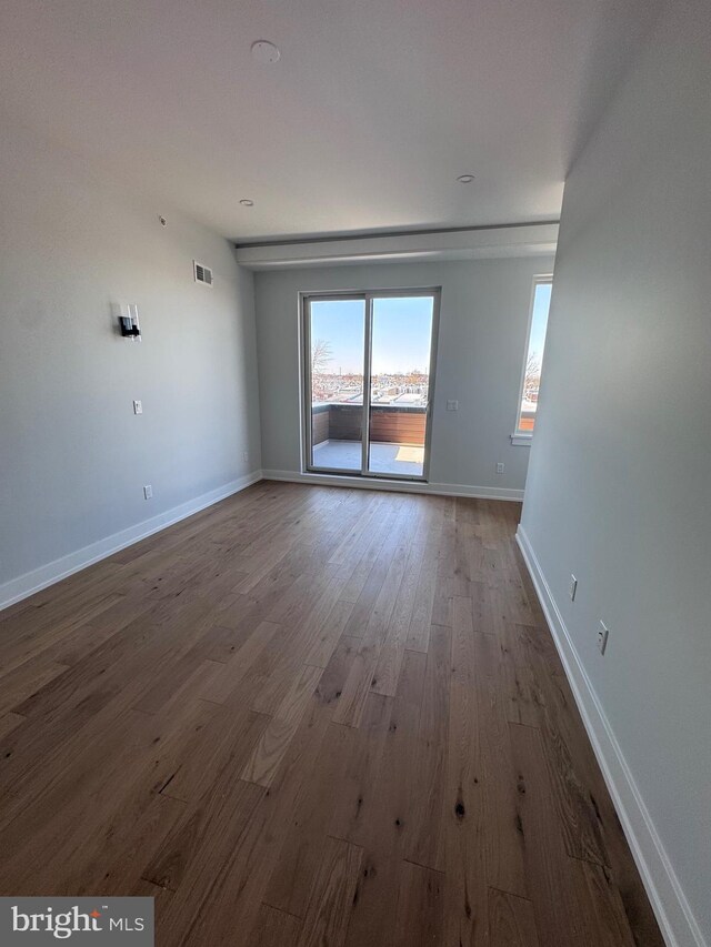 3003 Gaul St, Philadelphia, PA 19134 - empty room featuring baseboards, visible vents, and wood finished floors