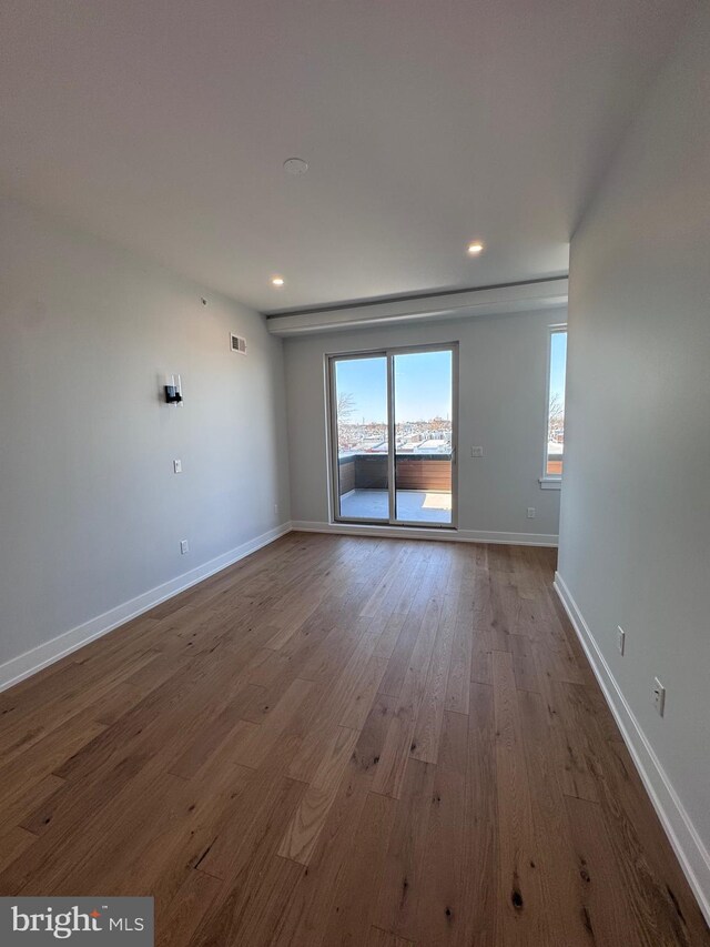 3003 Gaul St, Philadelphia, PA 19134 - spare room featuring baseboards, recessed lighting, visible vents, and wood finished floors