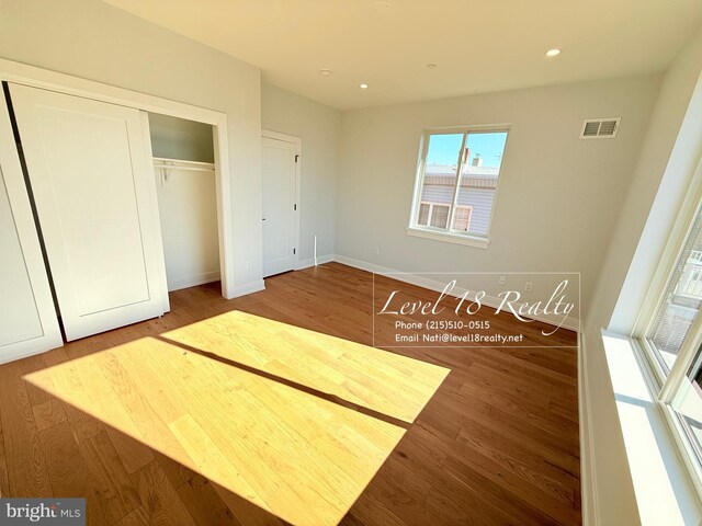 3003 Gaul St, Philadelphia, PA 19134 - unfurnished bedroom featuring a closet, recessed lighting, baseboards, visible vents, and wood finished floors