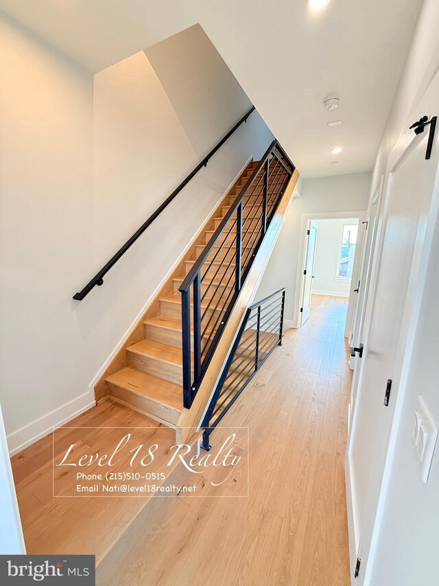 3003 Gaul St, Philadelphia, PA 19134 - stairway with recessed lighting, baseboards, and wood finished floors