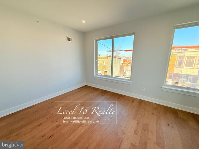 3003 Gaul St, Philadelphia, PA 19134 - empty room featuring recessed lighting, baseboards, visible vents, and wood finished floors