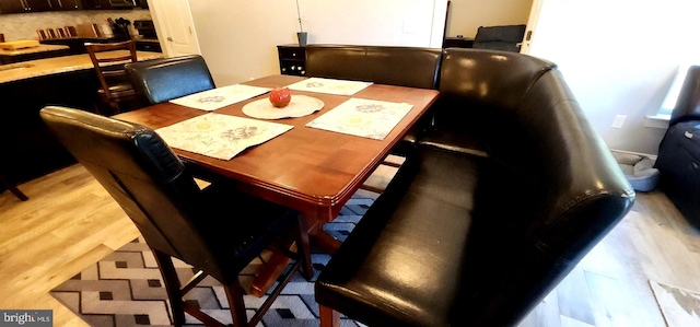 dining room featuring light hardwood / wood-style floors